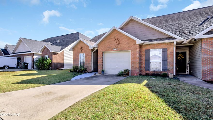 Beautiful Palmetto Ridge townhome in the heart of Lynn Haven. This end unit has many upgrades and is situated on a quiet street with a dead end and no thru traffic. This centrally located neighborhood rarely has a unit on market so here is your chance.



This home features 4 bedrooms with a downstairs master suite. New roof installed along with new front door, master bedroom window and many other updates to share at request. The kitchen has newly installed granite counter tops, including a breakfast bar that overlooks dining and living room area. All newer stainless steel appliances. There is a breakfast nook area in the kitchen also. Tile flooring throughout makes for durable and easy clean living (except for new LVP in one bedroom).

Their is additional storage under the stairs. The master bath has a separate shower and an oversize soak tub, dual vanities and a separate commode room, large walk-in closet. The upstairs bath has a skylight and one of the bedrooms has a cathedral ceiling. The rear porch is covered and perfect for entertaining.

Upstairs also includes a very large L shaped, unfinished bonus storage area with walk-in access, could easily be made into additional living space. 1 car attached garage with additional parking spaces nearby. 

Home is well built and has held up well to multiple storms. 9' high ceiling downstairs with 2x6'' wall studs, 8' high ceilings upstairs with 2x4'' wall studs. Crown molding in living-dining, master bed & bath. There is a large laundry room downstairs. 

All measurements are approximate and should be verified by buyer if important.