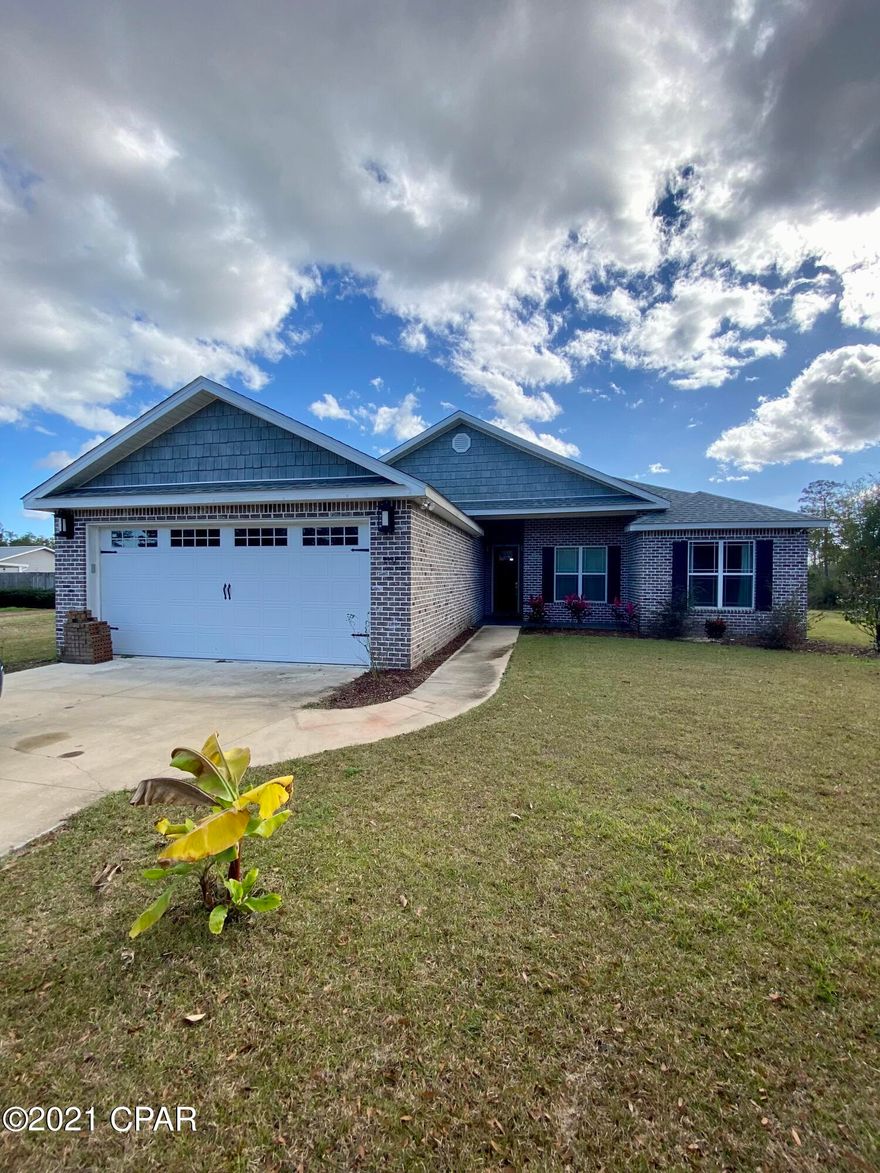 Welcome home to this beautifully updated craftsman with 1 acre of land on a cul-de-sac in Southport. This home features 4 spacious bedrooms with custom closets and 3 full baths with granite and storage. The large living room features 11 foot coffered ceilings, a wood burning fireplace with shiplap accent and tons of natural light through the doors to the backyard. The kitchen features stainless steel appliances, granite countertops and a large pantry. The adjacent dining area has a charming built in window seat with storage. The master bedroom is large and features a tray ceiling with shiplap accents. The master bath is equipped with separate sinks, a fabulous custom shower and a large walk in closet with shelving. The laundry room has storage cabinets and the 2 car garage has attic space Accessible through pull down stairs. This home has a whole home Culligan water softener system.