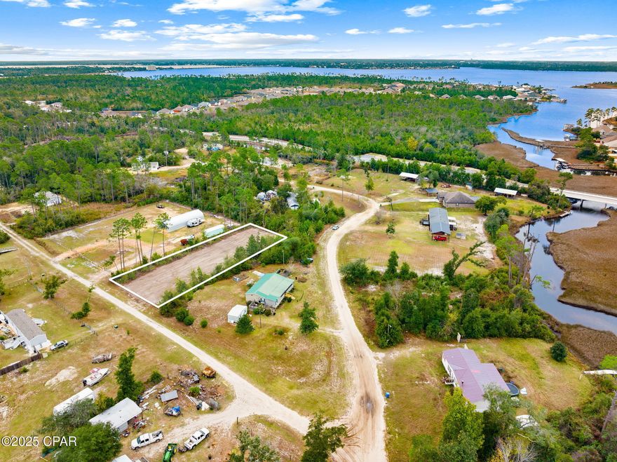 Build Your Dream Homestead in Southport!
Welcome to 404 Hickory Bluff Circle, a beautifully cleared and prepped lot ready for your vision. Whether you're looking to place a Duplex, manufactured home, Mobile Home or build a custom stick-built residence, this property offers the flexibility you need to create your perfect setup. High and Dry flood zone X. Zoned for Duplex/ Mobile Home. 

Located in a peaceful and established area of Southport, this property provides a roomy footprint for your home, workshop, garden, or recreational space. With the major prep work already completed, you can start building—or bringing in your home—right away.

Enjoy the freedom, privacy, and possibilities this homesite offers while still being just a short drive to shopping, dining, great schools, and the white-sand beaches of Panama City Beach.