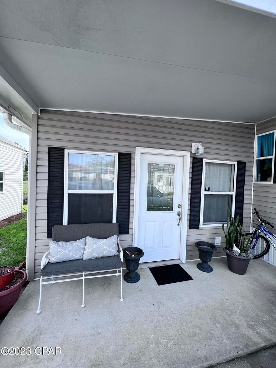 Fully Furnished home in a great location. This is a move-in ready 2 bedroom 2 full bath home. It's located in a quiet, gated community of Emerald Pointe Resort. Cute and private back yard with a screened-in porch where you can enjoy the evenings. The community has 2 pools, exercise room and a club house. A short 5 min drive to the beach. The rent includes water and trash. One pet up to 25lb will be considered.