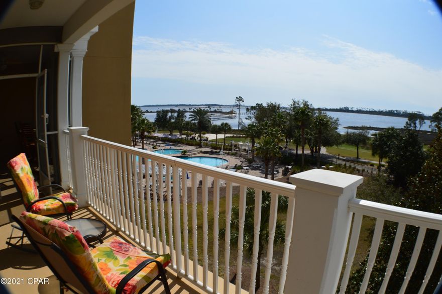 WOW and UNBELIEVABLE!! The only true way to perfectly describe this beautiful home. This home sits on the corner of the 4th Floor and has an AMAZING view that will take your breath away. Just outside the Master B/R is a fully screened-in patio giving you comfort and serenity! Also, Master B/R and bath is split from the two other AWESOME AND FULL SIZED bedrooms with THEIR INDIVIDUAL BATHROOMS as well!! Completely remodeled and updated, the floors and carpet are less than a year old and made to last. Kitchen has granite countertop and up-to-date appliances. The sellers loved it here and never rented. There is just too many amenities to list but the huge pool, golf, boating, marina, private beach, etc etc etc is a nice start. Unit sold fully furnished minus some owner's personal items.