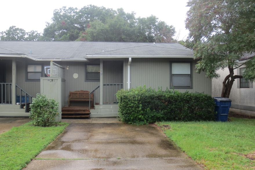 Location, location, location, 2 bedroom 2 bath well cared for duplex ready for you and your family. Kitchen has breakfast bar, smooth top range, lots of counter space and is open to the dining area and living room.  Living room has a cathedral beamed ceiling with sliding glass doors leading out to a screened porch.  Nice sized laundry room with fenced back yard. Perfect for the first time homebuyer or down town professional, located in a very convenient area of town. All appliances convey including the washer and dryer. Home has a current termite bond and the adjoining unit has their bond with the same company that assures you the best coverage. Call for your private viewing today.