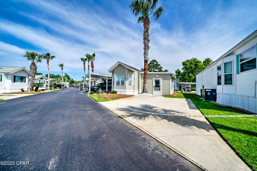 Don't miss this charming, well-maintained property located in Emerald Pointe Resort, one of the highly sought-after communities in Panama City Beach. The home features two bedrooms with a split floorplan, one full bathroom, one half bathroom, tile and laminate flooring, new furnishings, large living room addition, an open outdoor patio, a large lot with room to add on, and its being sold fully furnished. The home is move in ready, and perfect for a primary, vacation or investment property.
Emerald Pointe Resort is a gated community located in the heart of Panama City Beach close to restaurants, shopping, and the world's most beautiful beaches. Amenities include a large clubhouse, exercise room, shared library, 2 pools (one heated seasonally), hot tub, lake with boardwalk, and shuffleboard court. HOA fee includes water, sewer, garbage, cable, and lawn service. All information is approximate and should be verified by buyer if important.