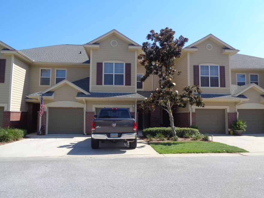 CURRENTLY UNDER CONTRACT. SELLER ACCEPTING BACK UP OFFERS.Centrally located 3 bedroom 2.5 bath town home in newer, well maintained, complex. Located in the gated community of Baldwin Rowe. This home features an open floor plan with high ceilings, nice moldings, a single car garage, and a screened patio overlooking the common area pond. The property is centrally located and near restaurants, schools and shopping.  This gated complex has a common area clubhouse and pool with maintenance and landscaping performed by the association.