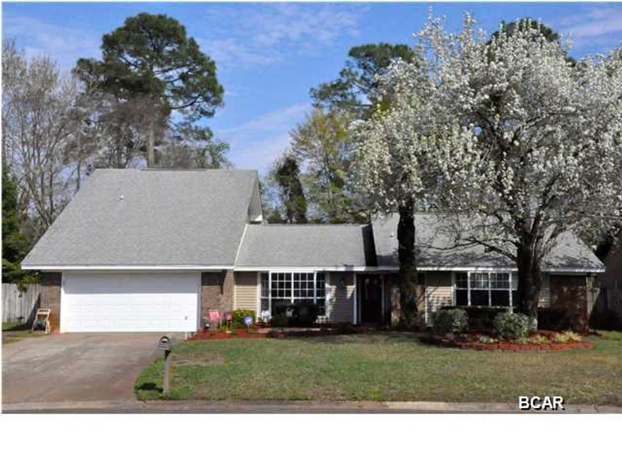 OPEN HOUSE SUNDAY, 1:30-4P!! A beautiful yard, refreshing pool and plenty of space make it easy to love this 4 bedroom 3 full bath. Wouldn't you love to leap in the sparkling pool?! This home is in an established, family friendly neighborhood close to schools and both bases. Entertain in style with formal dining, a giant Florida room overlooking the pool, big patio for grilling...plenty of space for all. The kitchen opens up into a den with wood burning fire place. Master bedroom and two additional bedrooms are on the first floor. Bonus room or 4th bedroom with full bath on second floor. There's a security system, a sprinkler system on a well, a shed out back and a termite bond in place. This home has been well cared for inside and out with fresh paint and carpet inside and