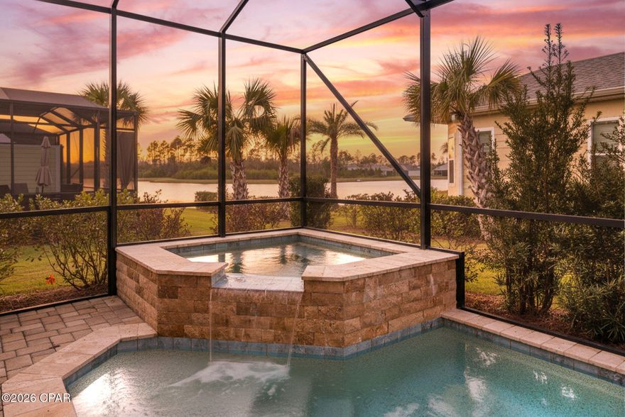 Welcome to this stunning Lucia floorplan in the Villa Collection, ideally located in Phase II near Town Square within the highly desirable Latitude Margaritaville Watersound 55+ community  just steps from the amenities. This home is thoughtfully designed with 1,774 sq. ft., 2 bedrooms, 2 baths, and a den/flex room with pocket doors, offering both comfort and versatility.

The true showpiece is the private, south facing saltwater pool and spa, perfectly positioned to capture breathtaking sunset views over the tranquil pond. The extended screened lanai creates an exceptional outdoor living space complete with gas grill hookup and mounted exterior TV, making it ideal for relaxing evenings or entertaining guests in a resort style setting.

Inside, this home is abundant with upgrades and features no carpet anywhere. Luxury vinyl plank flooring flows throughout, complemented by 8' doors, crown molding, window treatments, and elegant finishes. The kitchen is beautifully appointed with quartz countertops, tile backsplash, gas range, under and above cabinet lighting, pull-out drawers, trash pull-out, island trim, and all appliances included. The living area is warm and inviting with a trey ceiling, shiplap accent walls, and electric fireplace!

The primary suite offers a spa like retreat with dual separated vanities and a fully tiled shower. Additional highlights include a large laundry room with utility sink and washer/dryer, plus an extended length two car garage with space for storage or a workbench.

Residents of Latitude Margaritaville enjoy world class amenities including the Fins Up! Fitness Center, lagoon and indoor pools, waterfront dining and bars, pickleball, tennis, bocce, scenic trails, creative studios, and a vibrant calendar of social events. Nearby conveniences include shopping, dining, banking, a future Publix, planned marina, and new medical facilities while the white sand beaches are only 7 miles away.

This exceptional home offers luxury, location, and lifestyle, all in one unforgettable package.