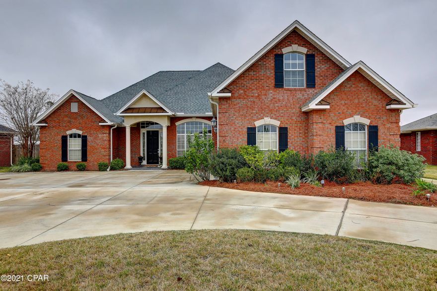 This executive 4 bd 3 1/2 bath pool home won't last long. Many details from solid core doors to beautiful crown moldings with trey ceilings,hardwood floors, tile and carpet.. Bedrooms have large closets especially the master with large walk in off master bath. No shortage of storage with loads of warm hardwood cabinetry in both kitchen and master bath. Entry way has large foyer with formal dining and living room plus half bath.  The laundry room is large enough to add a large freezer or extra frig, etc. Large bonus room upstairs with a bedroom and bath perfect for privacy. Master has own wing that leads to covered porch and pool. Kitchen is open to family room and fireplace with additional dining area and large pantry. Additional 2 bedrooms are large with privacy and additional full bath