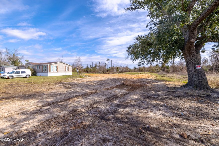 Owner willing to do a Lease with Option to purchase with $1,000 down, $450/month. 
 $100 of each payment credits the purchase price.  See MLS # 770380.  Very nice level lot located in Southport, FL.  Property previously had a large mobile home on it, but it was removed in 2024.  Municipal water available.  Utilities appear to be on site.  Great location for a homesite on a paved road.  
All information is taken from the Public Records.  If important to buyer, please verify.