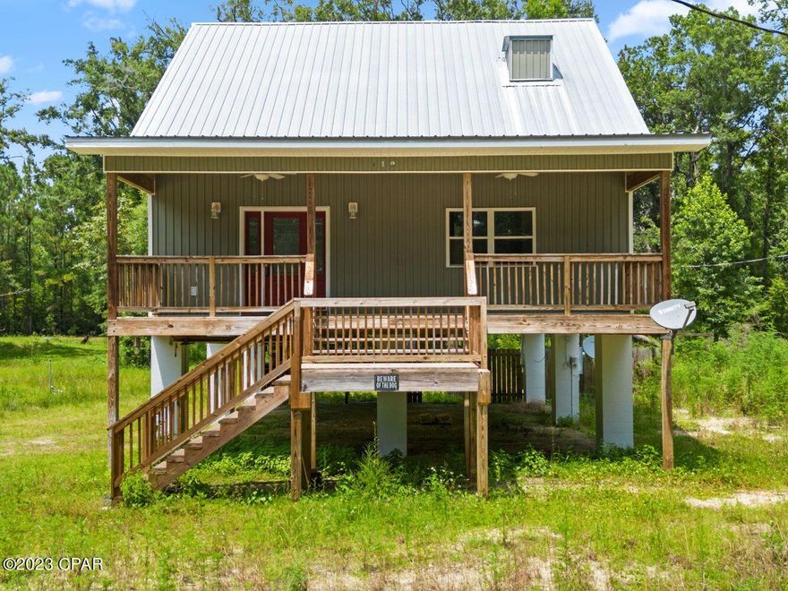 Escape to rural tranquility in Wewahitchka, FL! This charming 3-bed, 2-bath stilt house offers serene countryside views. Inside, enjoy a spacious living area with ample natural light. The modern bathrooms feature water treatment filters. Located near a boat launch, it's perfect for water enthusiasts. The property boasts a sprawling yard for gardening and outdoor relaxation. Embrace rural living with nearby amenities and schools. Don't miss this chance to own a peaceful retreat in Wewahitchka, FL. Schedule a viewing today!