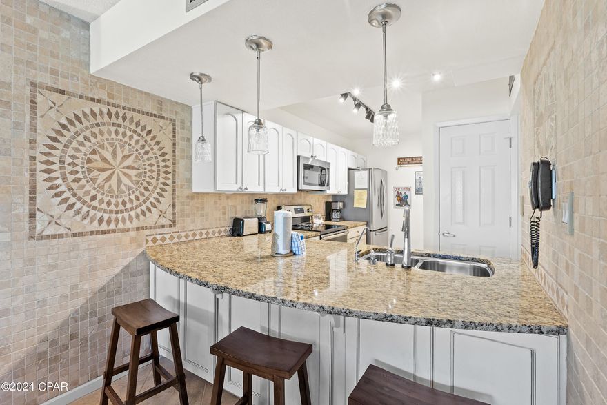 This gorgeous golf villa at Edgewater Beach resort has been updated and is sure to impress even the most discerning buyer. From the moment you step foot inside, vou'll be greeted by stylish finishes that are paired with a warm and inviting vibe. This spacious villa boasts one bedroom and two bathrooms, making it the perfect home for anyone who loves golf and the beach lifestyle. Inside, you'll find an open-concept living room and dining area that are perfect for entertaining. The updated kitchen features updated cabinetry, stainless steel appliances, and plenty of room for cooking and storage. The bedroom is generous in size and come complete with comfortable bedding and furniture. But the real highlight of this property is its location. Nestled within the Edgewater Beach resort, you'll have access to all the world-class amenities that this community has to offer. From the golf course to the white sand beach, you'll never run out of things to do. And when it comes time to wind down, you can relax on your own private patio and take in the serene views of the surrounding landscape. Perhaps best of all, the sellers are motivated to close quickly and are open to negotiations. Don't miss this opportunity to own a stunning golf villa in one of the most sought-after communities in Panama City Beach. Schedule your showing today! Edgewater has luxurious amenities including resort style pool, golf, shops, tennis, fitness center, delicious restaurants and more