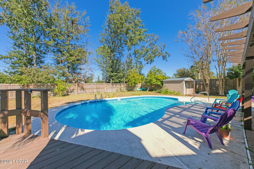 CURRENTLY UNDER CONTRACT, SELLER ACCEPTING BACKUP OFFERS Candlewick Acres/Northshore custom home. Well maintained 3 bedroom, 2 bath home boasting split bedroom floor plan, 2 living spaces, office, plus sunroom. The large in-ground pool has an open deck, pergola, and privacy fenced back yard. Shed in the back yard as well. This yard/backyard is an incredible oasis for relaxing or entertaining. Kitchen boasts Energy Star appliances. Additionally, there is access to a small canal that does lead out to the bay behind the home, but could only be assessed by something small like paddle board, canoes, and kayaks. Measurements to be verified by buers