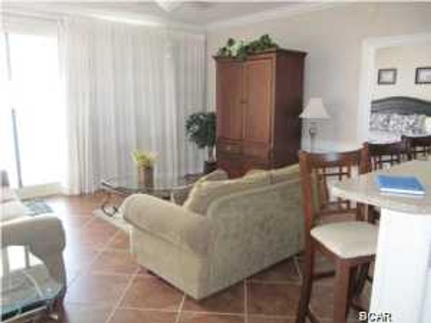 This 7th floor unit has a top of the line furniture package. This is a beautiful unit with extras and is on a great floor. Located on the much desired Thomas Drive within walking distance of Saint Andrews State Park. Within walking distance of fine restaurants, nearby fishing, amusement attractions and golf. Treasure Island offers a beautiful unobstructed view of the coastline while sitting on your balcony or relaxing in your unit. You can enjoy watching the fishing boats and ships going through the Pass while you relax on your large front balcony. Full glass views across the back of the units will allow you to have a breathtaking view of the beautiful sunsets, emerald water, and sugar white sandy beaches. The kitchen has granite countertops and GE appliances. The bathrooms are