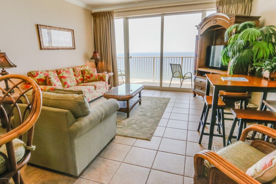 This beautiful one bedroom/one bath with bunk condo delivers the finest in upscale resort living! Accommodating up to 6 guests, this condo makes for a great vacation home or live-in ready. A stylish mosaic piece offers tasteful accenting as you enter this spacious open concept floor plan. The sparkling floor to ceiling windows promise breathtaking Gulf views from the living room and kitchen.  There is plenty of room for lounging with comfortable sleeper sofa, built in bunk area and plenty of dining space. The kitchen features granite counter tops, modern white appliances and a convenient breakfast bar. Plush carpet has been placed in the bedroom where you will find a queen sized bed and secluded bathroom access. The spacious private balcony is perfect for enjoying sunrise or sunset as you bask in the refreshing Gulf breeze. Tile flooring is found throughout the hallway, kitchen and living areas.

Boardwalk Beach Resort is situated directly on the beach and offers a tremendous strip of private beach for guests to enjoy. This 22 story Gulf Front condominium is located in the heart of Panama City Beach. The resort is surrounded by restaurants, golf, nightlife, shopping and family attractions. In keeping with a sensational reputation, Boardwalk features an endless variety of amenities and extravagances for you to enjoy.

Resort Features:
 
â€¢ Beach and Water Sport Activities 
â€¢ 16 Acres of Private Beach
â€¢ Beachfront Bar and Grill
â€¢ 2 Swimming Pools 
â€¢ 2 Gulf Side Hot Tubs
â€¢ Interactive Children's Splash Zone Pool Area
â€¢ Arcade / Game room
â€¢ Food Court open seasonally 
â€¢ Covered Parking and Security Gated Access

Age, dimensions and square footage are approximate.  Buyer should verify if important.