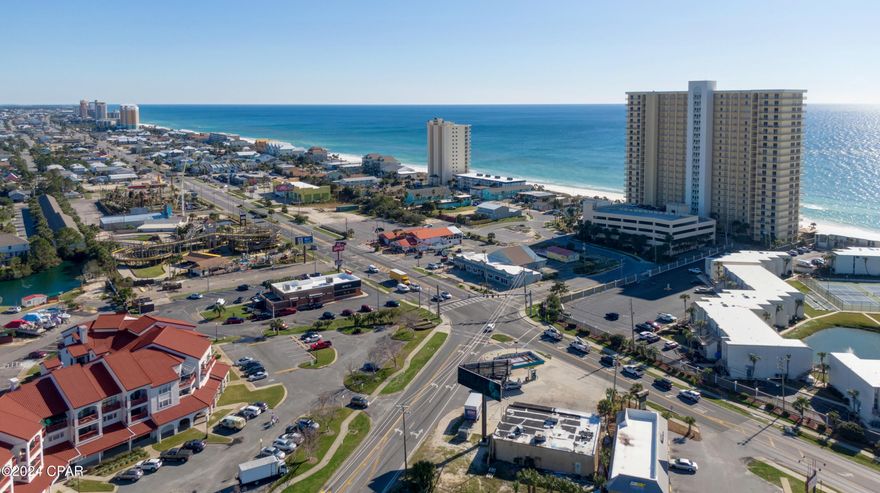 ** LOWEST PRICED CONDO IN PCB** For Sale in Panama City Beach,!! Located only a Block from the Sandy Beaches !!  This studio condo gets you a place in one of the most sought after beaches in Florida!   BYOB! Bring Your Own Boat! Panama City Beach studio condo!  This Amazing location is a short walk to public beach access #24 and sits directly on the Grand Lagoon leading out to the Bay! 
Amazing location and price to own a Beach Vacation home or Investment rental property!  Open parking in the secured complex.  The Amenities include a boat dock on Grand Lagoon that leads out to the Bay and then to the Gulf of Mexico, Shell Island.  This complex has an in-ground pool on the Lagoon, a  sauna, clubhouse, a fire pit, and tennis courts!  The Plaza of St Thomas are located above shopping and restaurants and are a short walking distance to public beach access #24.  Boat and trailer parking can be reserved for owners and you can dock your boat while staying in the condo.  Located on the 2nd floor allows you the option to walk the steps or take the elevator.  This studio condo is uniquely positioned above retail space, incorporating a restaurant into the complex.  This arrangement adds a layer of convenience, allowing residents to enjoy dining options without having to venture far from home.  The integration of retail space beneath the residential units contributes to a dynamic and vibrant living environment.  This studio condo at Plazas of St. Thomas offers a blend of security, leisure, and convenience, making it an appealing choice for those seeking comfortable experience while living or vacationing in Panama City Beach, FL.