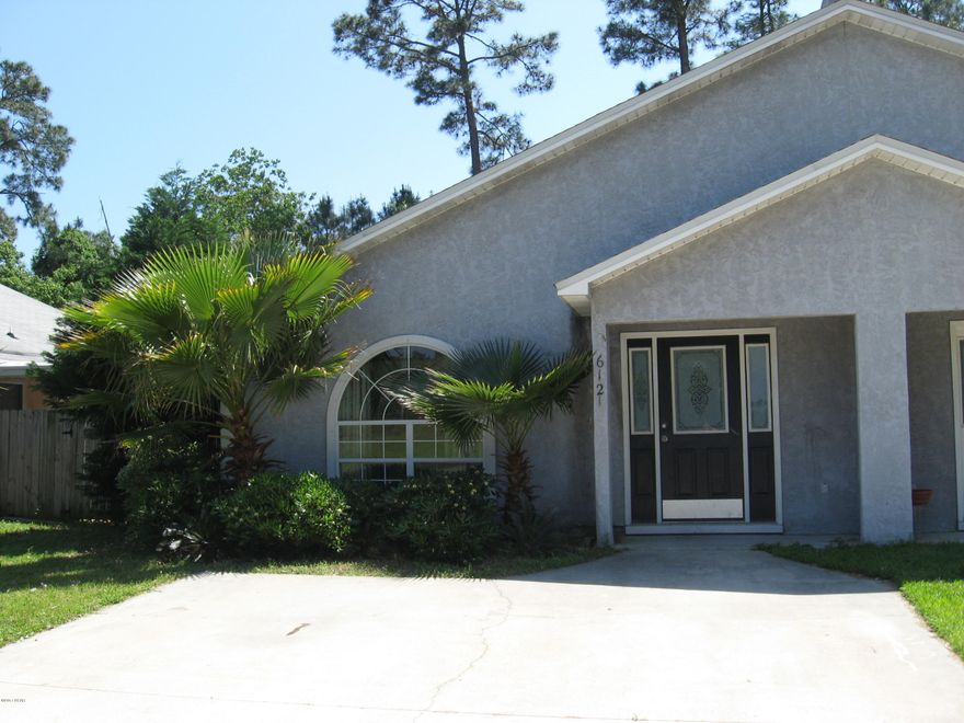 Thomas Drive area close to schools, beaches, shopping, fishing, marinas and Navy base. This two bedroom home has an impressive open floor plan with cathedral ceilings and chair rail in living and dining rooms with wiring for surround sound. All electric home with double pane windows and washer/dryer area. Ceramic tile in living room, kitchen and dining room. One year old carpet in bedrooms with fenced backyard and storage shed.