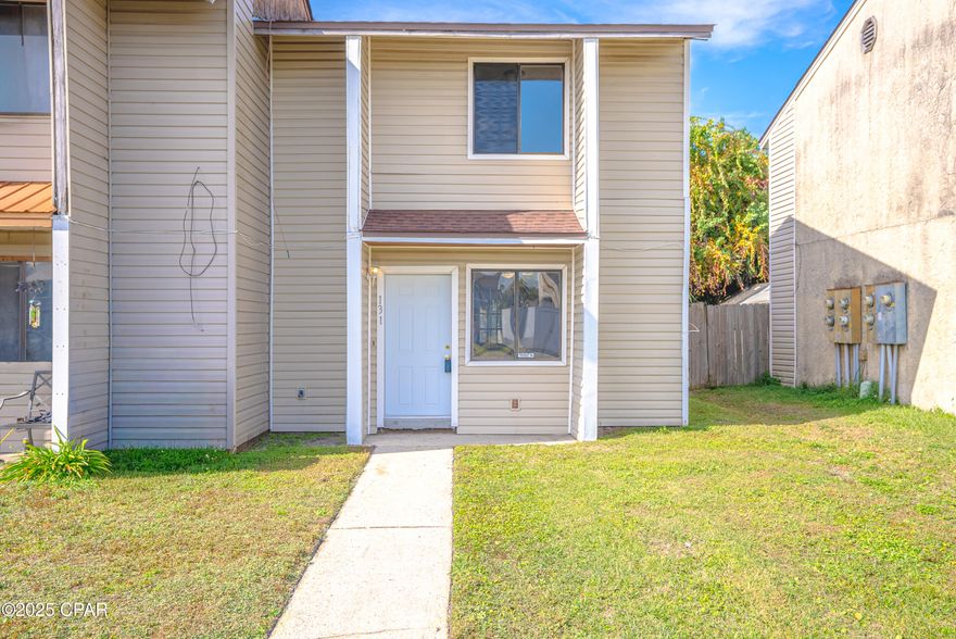 Charming End Unit Townhome — Affordable & Move-In Ready!

Discover this end-unit townhouse-style home tucked away in a quiet, non-HOA community, offering freedom from extra fees and restrictions. Step inside to find a freshly painted interior in neutral tones, creating a bright and welcoming feel throughout.

The updated kitchen shines with new cabinets, modern countertops, and stainless steel appliances, including a stove and hood. Enjoy the privacy of a fully fenced backyard and unwind under the covered back porch—perfect for outdoor relaxation or entertaining.

Conveniently located between Panama City and Tyndall Air Force Base, this home offers affordable comfort and value in a prime central location. Whether you're a first-time buyer or looking to downsize, this property is ready for you to make it your own!