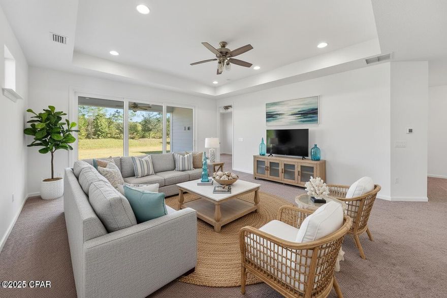 Currently under contract with a 72-hour kick-out clause. Welcome to Latitude Margaritaville Watersound, a luxurious 55+ gated community on Panama City Beach! This beautifully-designed, one-owner, single-level, Tortola Villa offers 2 bedrooms, 2.5 baths, a den/flex room, covered lanai, 2 car garage and 2,362 square feet under roof! Seller is also offering a $5,000 credit for flooring so you can upgrade the flooring to what you desire. 

This 2023-built, highly-upgraded Villa is so welcoming and you'll love enjoying the indoor-outdoor living we love in Florida for all months of the year. As you step into this Villa, you'll find 9' ceilings, an open concept kitchen, living and dining area. A kitchen island with beautiful granite countertops and upgraded stainless appliances, including a natural gas range, is perfect for entertaining guests and sipping on margaritas...because it's always 5 o'clock somewhere!  HUGE upgrades here you will benefit from: Impact Windows, Impact Doors and Impact Garage, Lighting, Electrical Upgrades throughout. and more!

The living room features a tray ceiling to 10' and a large sliding glass door to the covered lanai. A unique feature of the Tortola plan is two primary suites PLUS a flex room! In this split floorpan, just off the living room you'll find a spacious suite overlooking the back yard. This primary suite offers a tray ceiling to 10' and a spacious primary suite bath with double vanities, a tiled shower and a closet you've always dreamed of! 

This true split floor plan makes it great for guests to come visit and offers a full bedroom and bathroom on the front of the home. An added den is also great for flexibility for those who wish to work at home, have a bonus room for crafts or even additional sleeping space if desired. Add in a powder room and this one makes this the most desirable Villa in Latitude Margaritaville! The laundry room is large and offers upgraded cabinetry with direct access to the 2-car garage. 

This home offers the following as upgrades: hurricane rated impact windows and doors, impact hurricane rated garage door, window coverings, granite countertops, tiled showers, glass shower enclosure in rear primary suite, undermount sinks, 8' doors, recessed lighting throughout and white shaker cabinetry.

Do not miss this opportunity to live in this gated community and start living your best life in Latitude Margaritaville Watersound! This community offers remarkable amenities where you'll enjoy a fitness center, movie theater, pet spa, business center, workshop, restaurants, resort-style community pool with beach entry and swim-up bar, tennis and pickle ball courts, bocce ball courts, kayak launch & more. 

Ideally located just minutes from the sandy beach, this Jimmy Buffet inspired community is a destination where it's always 5 o'clock somewhere! Inquire today to begin living your best life!