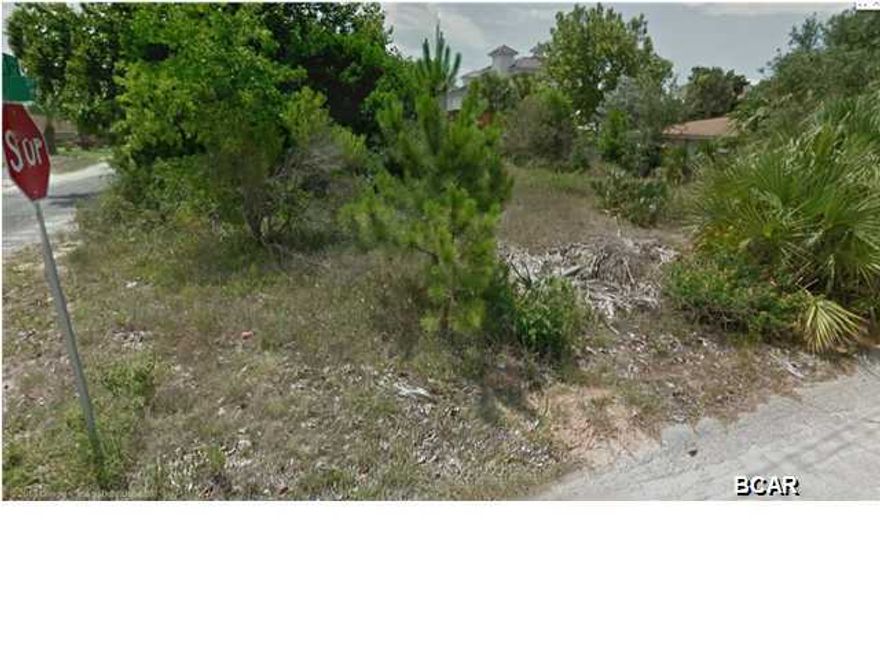 Corner lot in Laguna Beach available, just a couple of blocks from the beach! Public beach access #77 is on the south end so it's a straight shot to the Gulf of Mexico. You can access this property from both Front Beach and Back Beach Roads. Great spot for a home or duplex. All info is approx. and must be verified by Buyers if important.