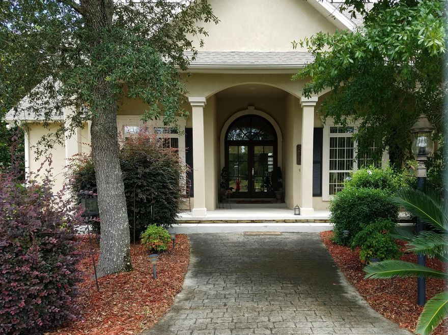 Everything you would want in your Dream Home!  Split Floor Plan with Open Living and lots of natural light are just part of this beautiful custom built home!  Enjoying your fireplace in the winter and then your enclosed pool in the summer! A kitchen with granite counter tops, wood cabinets and beautiful appliances is connected to your formal dining are and a breakfast area overlooking the pool. A beautiful place to entertain and to just enjoy life!  This home is a must see!