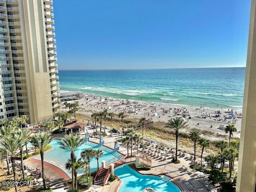 **Gulf-Front Gem at Shores of Panama! - Feels Like a Mini 2-Bedroom!** Welcome to Unit 909 where stunning views and smart design come together! This unit offers 1 bedroom, 2 full bathrooms, and a private bunk room** comfortably sleeping like a 2-bedroom, making it an ideal vacation rental or beach retreat. Includes a deeded parking space on the same floor! Enjoy breathtaking views of the Gulf through the spacious open-concept living area. The unit features **updated flooring throughout**, **updated coastal décor**, **updated countertops and sink**, **updated appliances**, and plenty of natural light.  Shores of Panama is one of Panama City Beach's premier destinations, located just moments from **Pier Park**. Resort amenities include: *Expansive 14,000 SqFt Lagoon-style pool with fountains and tropical landscaping, heated indoor pool for year-round enjoyment, multiple hot tubs, fitness center with modern equipment, private beach access steps from your unit, on-site coffee shop, Sunset Beach Bar & Grill, covered parking garage & 24-hour security. Don't miss your chance to own this beautifully updated, rental-ready Gulf-front condo that offers both personal enjoyment and strong investment potential!