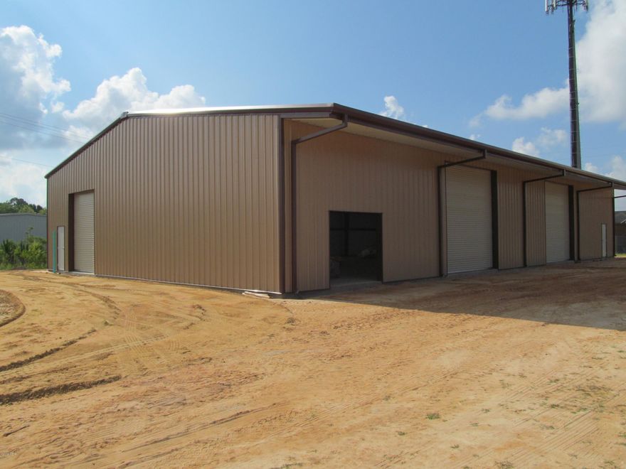 Hard to find Commercial Warehouse space in the heart of Panama City. Building construction is scheduled to be completed and ready for occupancy on or before 01-01-18. The building and site includes open span space, 16 ft. Eves, 200 Amp Three-Phase Power, tractor-trailer access, one glass storefront, three personnel doors, two restroom, Storage closet, Refrigerator hook-up,  two front 14 X 14 ft. roll-up doors and a 10 X 12 ft. roll-up door on each side. Landlord owns additional contiguous land and can fence and provide laydown yard area. Laydown yard and additional interior build-out is negotiable. Lease is modified gross rate and includes property taxes, building insurance, water and sewer.