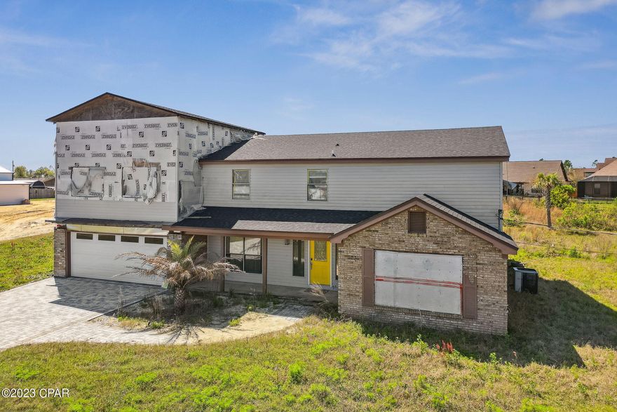 CURRENTLY UNDER CONTRACT SELLER WILL ACCEPT BACK UP OFFERS 

INVESTORS DREAM! ARV $575,000 . Home sits on 3/4 of an acre in a quiet area of Lynn Haven 1/2 mile to the bay. All materials inside the home convey to the buyer. Improvements that have been completed so far include New Electric Panel, new outlets, new kitchen cabinets, countertop, new siding, new roof, paver driveway and back patio, new paint/ sheetrock, jacuzzi tub, new lighting, hurricane grade garage doors/locks, new stucco on back of home, Viking appliances inside and new hot water heater. Special financing available 


*addition over garage was not permitted when seller purchased it.