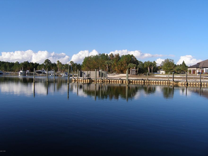 Unbelievable 130' of Beautiful Waterfront Opportunity! This property has a one of a kind view. Located right across from the opening of the Dolphin Bay Marina in Historic Woodlawn Subdivision.  There are few views such as this. Located almost at the foot of the Hathaway Bridge. Within a mile of the Navy Base. 3 bedroom 2 bath fully functional but the house has not been updated in 30 years. It is livable until you decided what you want to do but the intent should be rebuilding on this one of a kind lot. Many of the neighbors have torn down and rebuilt spectacular homes or the home can be updated with the right vision. Will sale quickly, call today!