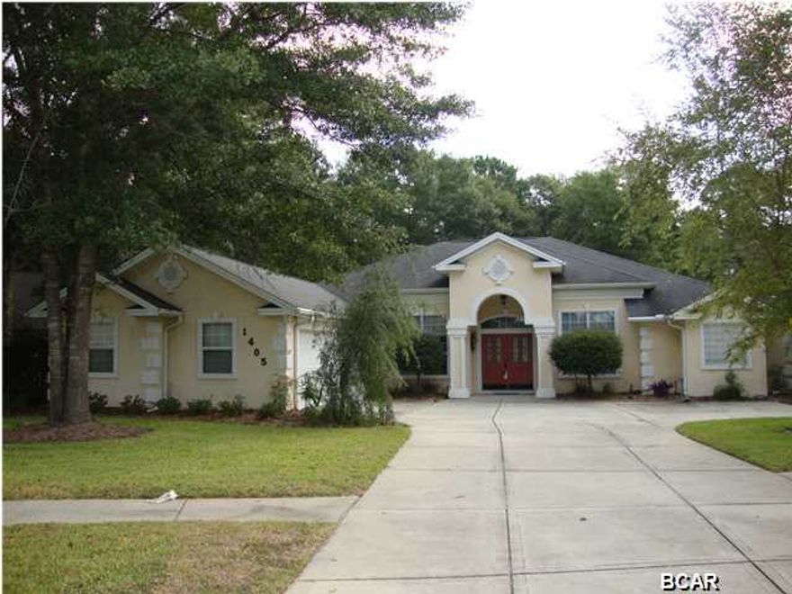 EXCEPTIONAL HOME LOCATED IN A GREAT SUBDIVISION. Upon driving up to this lovely home with plenty of parking including the oversized garage you will enter through leaded glass doors into an open foyer, formal dining and living room with beautiful plank hardwood flooring flowing throughout and 10' ceilings, continue to the spacious fully equipped kitchen with a breakfast bar, plenty of custom cabinets, breakfast area with tile flooring and a cozy family room with a brick hearth and fireplace. Split bedroom plan features the large master bedroom with tray ceiling, master bath with tile flooring, double sinks, whirlpool tub and separate shower. The master closet has built in dressers,shelving spacious dressing area. The fourth bedroom/office is located off the master bedroom and foyer