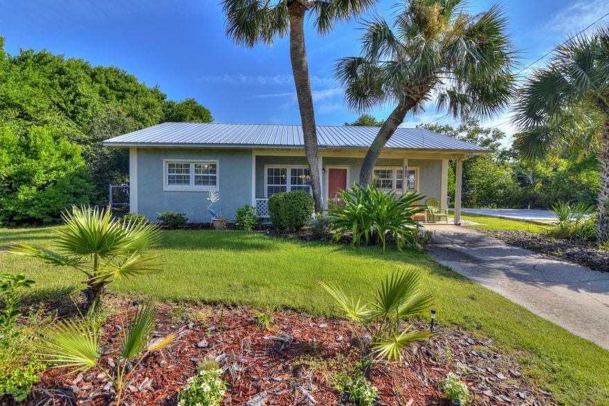 This Adorable 4 Bedroom, 3 Bath, Beach Home Is Only 2 Short Blocks From Our Beautiful White Sandy Beaches and Beach Access 87! Mostly Furnished with a few exceptions. Completely Remodeled In 2010 With New Everything From Top To Bottom! All New Windows, Flooring, Doors, Trim, AC, Metal Roof, Septic Tank And Much More! The Kitchen Has Beautiful Cabinets, Granite Counter Tops, Tiled Backsplash And Stainless Appliances. 

The Master Suite Is Huge, With A Large Bathroom And Walk In Closet. The 3 Additional Bedrooms Are All Nice Sized, And One Is Complete With A Full Bathroom. 

In The Backyard There Is A Cabana And An Enclosed Outside Shower! Washer, Dryer, New Patio Furniture, Personal Items Do Not Convey. If Details/measurements Are Important To You, Please Verify.