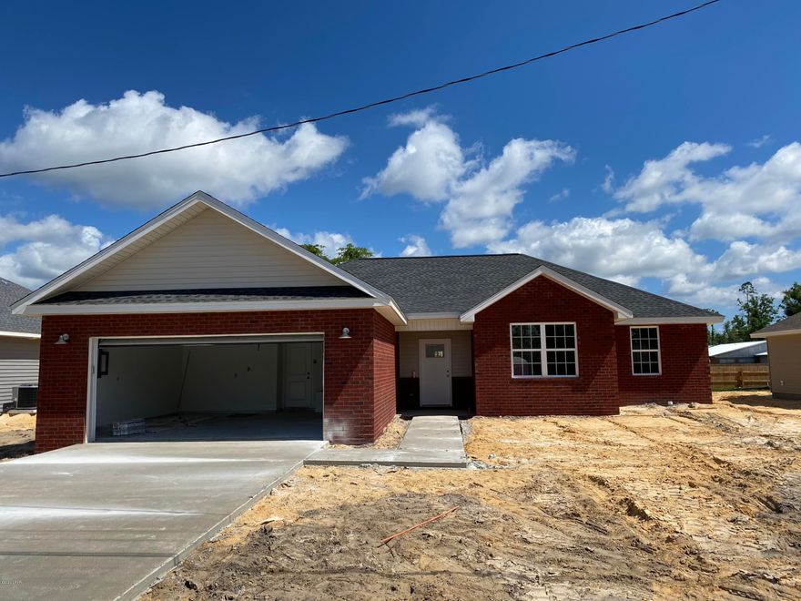 NEW CONSTRUCTION IN LYNN HAVEN - NO HOA



Beautiful new home under construction in the heart of Lynn Haven. Interior of home includes LVP flooring throughout main areas, carpet in the bedrooms, tile in the bathrooms, tray ceiling in great room.  Great room also includes elevated electrical outlets for mounting the TV on the wall. Master bedroom has tray ceiling, custom barn door, and large walk-in closet in the master bathroom. Kitchen will have stainless steel appliances, dark gray quartz countertops, and black fixtures and hardware. Exterior of home is built with brick front and vinyl siding, two-car garage, covered back porch, & fully sodded yard with sprinkler system.