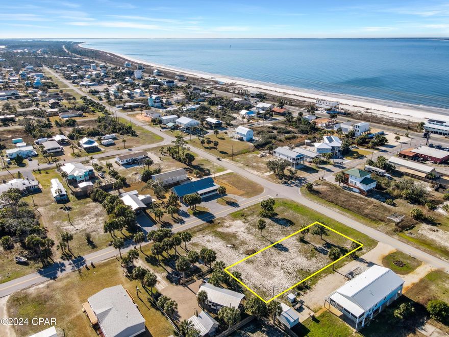 Nestled peacefully on a quiet dead end street, this 0.26-acre residential plot offers effortless and accessible proximity to the unspoiled beach. Just a relaxed walk away, you'll discover a local gem — Shipwreck Raw Bar — and the awe-inspiring Gulf waters. Embrace the fantastic chance to design your ideal residence in the sought-after St. Joe Beach. For additional comfort and recreational choices, a brief drive or bike excursion leads you to Beacon Hill Park, boasting amenities such as outdoor showers, a dog park, playground, restrooms, athletic courts, and more. Embody the pet-friendly ambiance of St. Joe Beach and pamper your cherished companion with a pleasant day at the shore. Delight in the distinctive allure of this location, where the sandy shores allow for beachside bonfires, creating an authentically unparalleled experience. This isn't just a property; it's an invitation to an exceptional and gratifying coastal lifestyle.
