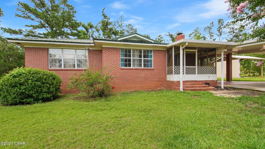 CURRENTLY UNDER CONTRACT, SELLER ACCEPTING BACKUP OFFERS-Multi family, a rare find, 3 homes on 3.1 acres in a remote setting. Enjoy quiet living with roaming deer, birds & other beautiful wildlife with plenty of room to have horses, gardening & other fun additions, only a few minutes to Marianna and its retail stores. High and dry with a 2 Bd 2 Bath Brick house, 3 Bd 2 Bath mobile home and an almost finished 2 Bed 2 bath guest house for a total of 7 Bd and 6 full baths. Brick House has new Kitchen appliances and large carport Brick house and mobile home have Fireplaces. Mobilehome has split bedroom design, new roof & updated/repaired A/C.  Guest house has a new roof, new siding and bath fixtures.  Access to property available only through licensed Real Estate agent. Buyer to verify all inf