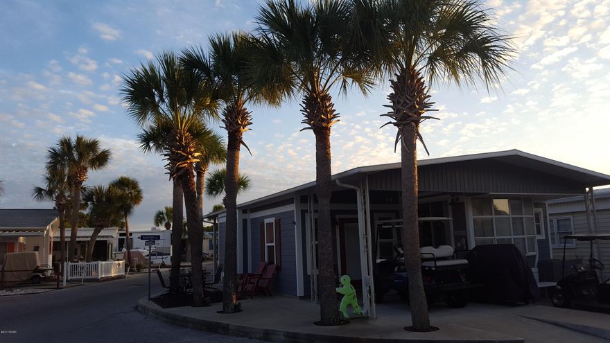 Great opportunity to own in one of the most sought after vacation communities, Venture Out. Everything you need is right inside the gates, boating, swimming, shuffleboard, tennis and your very own beach directly on the Gulf of Mexico. Huge corner lot at intersection of Sailfish and Grouper. Large covered patio with palm trees lining perimeter of property. Also has an outside storage building. This property is priced to sell. Don't overlook this one.