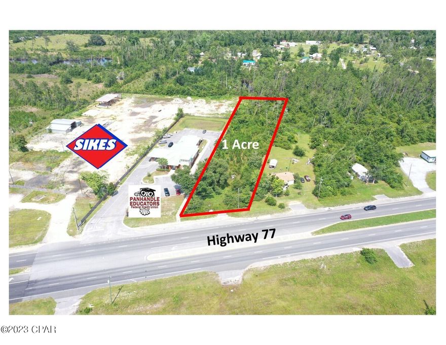 One acre on Highway 77 in Southport. Approximately; 111' x 557' x 98' x 508'. Located adjacent, and south of Panhandle Credit Union. Zoned C-3, General Commercial in unincorporated Bay County.