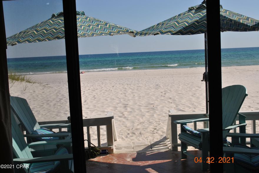 UNDER CONTRACT - ACCEPTING BACKUP OFFERS.......Paradise is when you walk right out on the sand from your patio.  Very unique property.  You own 13 ft of gulf front property, not just air.  This townhouse has 2 bedrooms, 3 baths and lots of beautiful sunsets.  Furnished and rental ready but you just will not want to ever leave this beach house.   Entire building was renovated in 2019 with hardie plank, paint and gutters.  Come see for yourself!