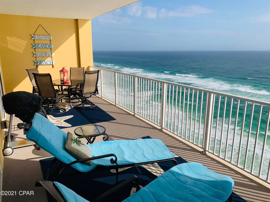 Known for its oversized 10x28 gulf-front balconies, this fully furnished, luxurious, Tropic Winds Condo has never been rented and includes two assigned parking spaces! Numerous upgrades include: two walk-in showers; new A/C & hot water heater (2021); tiled floors, backsplash and breakfast bar facing; new carpet (2019), stainless appliances with front loading washer/dryer; upgraded toilets; gorgeous light fixtures; laundry barn door and custom cabinet; wainscoting entrance; black-out curtains; and new wrap-around sofa (2018). The living room and master bedroom adjoin the balcony.  Enjoy the gulf views and sound of the waves from your master bedroom. The guest room includes queen bed and triple bunks! Tropic Winds is located in a more residential area on the west side of Panama City Beach. Buyer to verify all measurements/dimensions and square footages if important.   The two, assigned, parking spaces are covered and side-by-side in the garage across the street.
