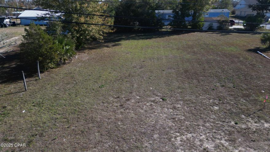 This property allows for mobile homes, a duplex, or a single-family home to bring all offers. The zoning is MU2.  Tap fees will need to be paid for this lot.