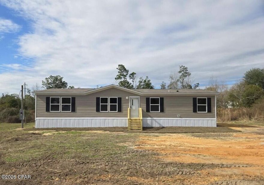 MOVE-IN READY | BRAND NEW 2026 4BR/2BA | 0.50 ACRE | NO HOA| CLOSE TO THE BEACH.

Don't miss this opportunity to own a brand-new 2026 double wide offering 4 bedrooms and 2 full bathrooms with a spacious open-concept layout designed for modern living.
Situated on 0.50 acres with NO HOA, this property offers the space and freedom buyers are looking for.
This home is fully set and ready to go with a new well, septic system, and brand-new central A/C unit, giving you peace of mind and eliminating major upfront expenses.
Enjoy outdoor living with brand-new front and back porches, perfect for relaxing or entertaining.
The mobile home title has been retired and the home is permanently affixed, making it eligible for FHA and VA financing (subject to lender approval) -- a rare find for a new manufactured home in this area.
Located in a quiet setting while being just approximately 20-25 minutes from Panama City Beach, giving you quick access to the Gulf, dining, and entertainment.
Why this home stands out:
Brand New 2026 Construction - Never Lived In 4 Bedrooms / 2 Full Bathrooms
Situated on 0.50 Acres
Brand New Central A/C System
New Front & Back Porches
Title Retired & Permanently Affixed
New Well & Septic System
Move-In Ready - No Delays
Easy Access to Panama City Beach
Priced to sell -- schedule your showing today before it's gone.