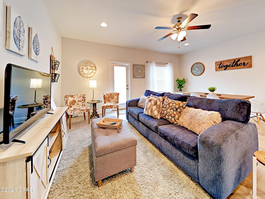 LOCATION IS EVERYTHING! The FULLY FURNISHED & BEAUTIFULLY maintained 3 bedroom, 2.5 bath townhome features profile cabinets, the original granite and Barnwood vinyl Plank flooring which has been well preserved. The townhome has 9' ceilings down stairs. Pantry in kitchen. Vinyl plank floors. Plenty of storage and walk in closet @ master. Right down the road from the Navy base, 5 minutes from the beach, 10 minutes from Pier Park, and surrounded by a plethora of EXCELLENT local food options.  All appliances and furnishings convey with the property.