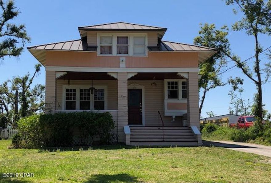 Seller very motivated!  Bring all offers!This is a beautiful home showcasing of our southern way of life.  Beautiful two story home with beautiful original wood floors and the staircase is magnificant.  Perfect home for that couple that would like to live in this quaint lovely home . You can view  the Anderson Bayou that goes into the Bay thru the front windows and front porch.  All appliances are on natural gas except the ac/heat unit  it is electric and the wall oven is electric also.