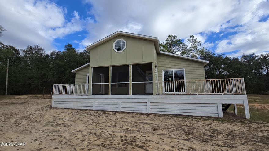 Discover the potential of this charming 2-bedroom, 2-bath home situated on just over 1 acre in the peaceful Compass Lake community. This property offers a wonderful blend of privacy, space, and opportunity, perfect for those looking to add their personal touch.

Inside, the home features a comfortable layout with plenty of room to grow. While it could use a bit of TLC, the inviting design makes it an excellent canvas for upgrades or customization.

Step outside and enjoy multiple outdoor living spaces, including a welcoming front porch, an open deck ideal for relaxing or entertaining, and a screened porch that lets you enjoy the Florida breeze year-round.

Whether you're a first-time homebuyer, investor, or someone searching for a peaceful retreat, this property delivers endless potential in a beautiful natural setting.

*Property is being sold AS-IS. **Information provided is deemed reliable, but is not guaranteed and should be independently verified by the buyer**