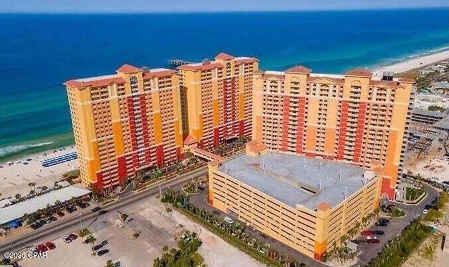 Gulf-view condo in one of Panama City Beach's newest towers, ideally positioned steps from Pier Park's dining, shopping, and entertainment. This spacious 1-bedroom residence with bunk alcove offers over 1,100 square feet of well-designed living space, an unusually large layout for a one-bedroom condominium. The open kitchen and living area extend to an oversized balcony where sweeping Gulf views and coastal breezes become part of everyday living. Interior finishes include quartz countertops, stainless appliances, coastal-inspired accents, and durable tile and luxury vinyl plank flooring designed for beach living and short-term rental use. Located in Calypso Tower III, the newest Calypso building completed in 2020, residents enjoy resort amenities including a large heated pool, spa, fitness center, beach access, gated parking, and onsite retail. The property sits directly across from Pier Park, placing restaurants, nightlife, Topgolf, and entertainment within walking distance. This property presents a compelling opportunity for cash buyers seeking Gulf-view real estate in a high-demand vacation market. With immediate occupancy available and strong tourism demand in the surrounding area, the unit works equally well as a personal beach retreat or income-producing vacation rental.