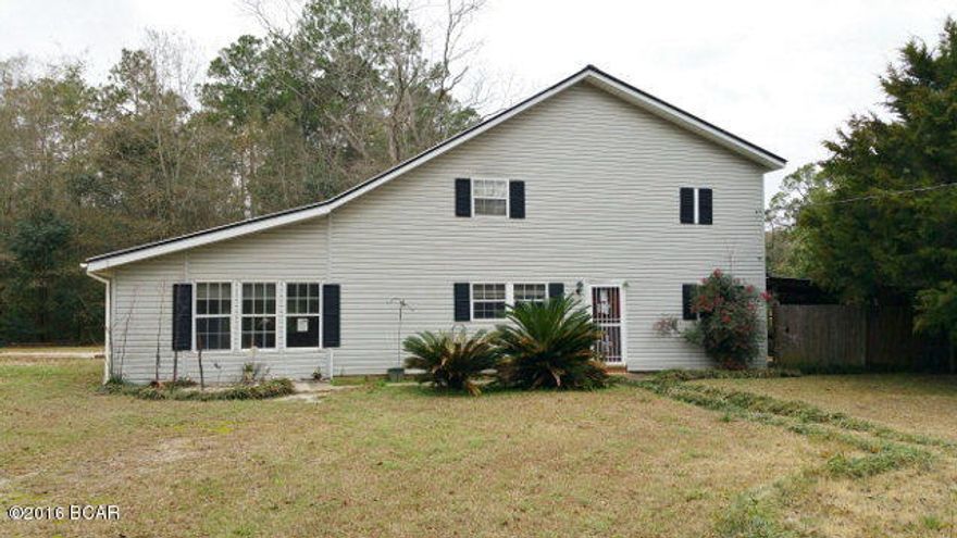Priced to sell ! ! Perfect home for your family in the center of Bonifay, Florida. Close to schools, shopping and employment. Located at the end of a quiet, dead-end street. Custom made cabinets and tile in kitchen and dining room. Master bedroom and bathroom is located on the second floor. Huge walk-in closet in Master Bedroom. Nice yard with fruit trees and privacy fencing. Come see this home today ! !
