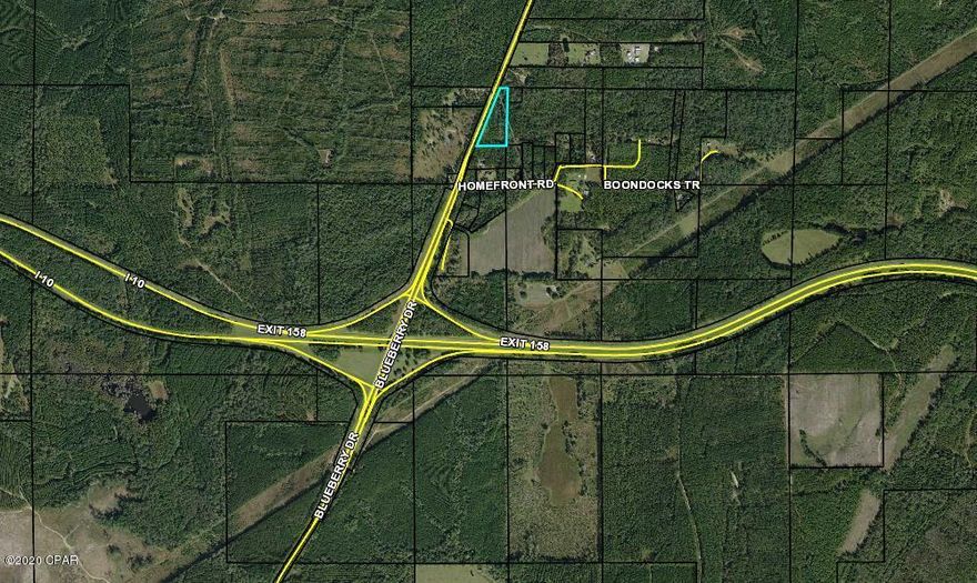 Good location off I-10.  Wooded and ready for the right person or company to develop.  Lots of road frontage on State Road 286.  Many possibilities at such a great location.