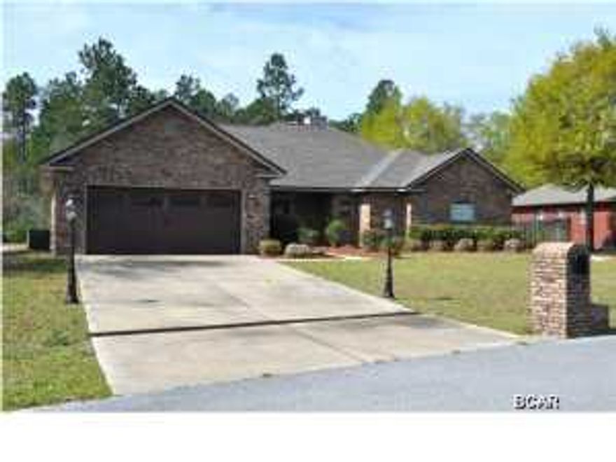 This is an exceptional foreclosure in the Cedar Creek Chase subdivision. This all brick home is ready for new owners and has 4 bedrooms and 3 full baths. The living room features 10 foot ceilings and a corner fireplace with lots of natural light. Right next to the living area is the kitchen will all wood cabinets and solid surface counters, breakfast bar and stainless appliances, and adjoining formal or informal dining space. There is also a built in office space! This home features a split bedroom plan. One end of the home has three nice, large bedrooms. The front bedroom is directly across from the hall bath and has its own walk in closet. The middle bedroom features a built in desk/workstation and could be used as a student's room or home office. The back bedroom is also large with