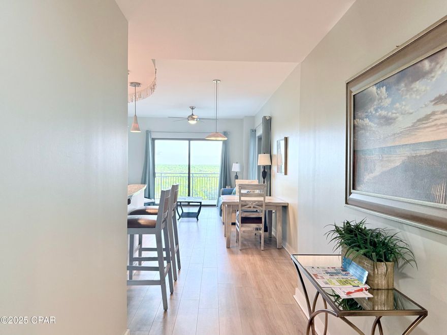Here's your chance to own a 2 bed, 2 bath lockout condo at Origin!  Lockout units are rare in PCB, and rarely do they come up for sale.  Unit 1019/1021 is being offered fully furnished and rental ready!  Unit 1019 is a 562 sqft studio unit complete with it's own kitchenette, HVAC unit, water heater, private balcony, and sleeps 4.  Unit 1021 is a 877 sqft  1 bed, 1 bath unit with a full kitchen, HVAC and water heater, stackable washer and dryer, a large private balcony with Gulf views, and sleeps an additional 4 people.  Both units have been renovated together making the flow through the lockout doors seamless.  There is no carpet in either unit, just beautiful LVP flooring and ceramic tile.  Recent renovations include new lighting, new paint, new drapes throughout, upgraded washer and dryer, smart thermostat, several new pieces of furniture, a new dishwasher, 2 recently replace hot water heaters, and new decor.  From the moment you walk in either unit, you are welcomed with the subtle beach tones and relaxing vibes!  These lockout units are a great way to acquire your dream of beach property while getting 2 units for less than each separately.  Studio units in Origin are asking in the low 200's currently, and 1 bed units are asking around $300k.  With a combined value of over $500k, units 1019 and 1021 can be had together for well under those values!  Additionally,  your options are endless.  You can rent both units on the short term rental market as individual rentals, rent them together as one large unit, live in one and rent the other, or simply live in both and have the much needed space for guests, a home office, a roommate, or any other configuration you can dream up.  There are Gulf views in unit 1021 from the living room window, and from the balcony.  The county pier is well within sight, giving you a great place to watch the many displays of holiday fireworks over the Gulf.  Both 1019 and 1021 also have views of West bay from the living areas and balconies.  There is a deeded beach access just across Front Beach Road, and within walking distance to a multitude of beachfront bars, restaurants, entertainment, Pier Park, and Top Golf.  Origin offers many amenities including two BBQ grill/picnic areas, a heated pool, hot tub, theater, game room, laundry facility, vending, a gated community with 24-hour security, Beaches and Cream convenient store and grill, and a Sunsations beach store located on the ground level. Origin is also one of the only high-rise condos on the beach that offers interior corridors that will keep you out of any inclement weather.  The seller is motivated, so give me a call today to schedule your private viewing and make your dreams a reality with your own piece of paradise!