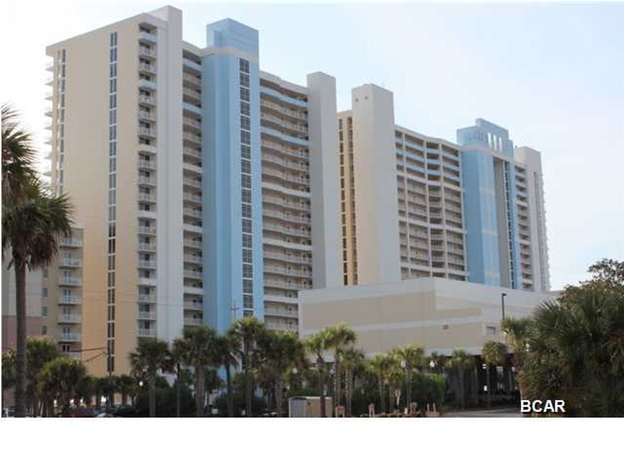 This adorable two bedroom, two bath condo is a MUST SEE! Decorated with a fun beachy theme, this unit is turn key and ready for a new owner. The gulf front views from the spacious living/dining area and kitchen are fabulous through the floor-to-ceiling windows leading out to the large balcony. The spacious kitchen features a large breakfast bar, plenty of storage and stainless steel appliances! Both bedrooms, as well as the living room boast large flat screen TV's. Majestic Beach Towers' amenities are second to none, boasting two indoor pools, two large outdoor pools, bar and grill, tennis courts, convention facilities, movie theater, the best workout facility in town complete with sauna and steam rooms, game room, Starbucks and much more! Call today to see this gem!