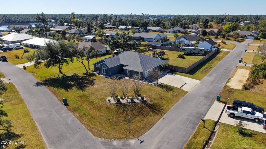 Check out this great piece of property just a little over half an acre, located in the peaceful and serene Pelican Point community. Located east on Old Bicycle Road/Hwy 2297, this ideal property provides country living retreat from the hustle and bustle with an easy commute into town. The property is situated on a large corner lot, with a 12ft double-gated access to the backyard, offering plenty of room for a RV or boat storage. The seller spared no expense with additional features to include all new flooring, premium updated finishes in the kitchen with new appliances, elegant granite countertops, the stylish tiled backsplash and deep farmhouse sink. Split bedroom plan features the master bedroom tucked away with updated vanities in the master bathroom and large walk-in closet. 3 additional bedrooms plus double vanity hall bathroom can be found towards the front of the home. The oversized screened in back porch will make a great setting for outdoor gatherings. The expansive backyard has plenty of room for outdoor recreation with the playground included. Additional features include: new roof, new HVAC, windows, new carpet in the bedrooms and exterior paint. Call today to preview this great property today! All sizes/measurements are approximate; please verify if important.