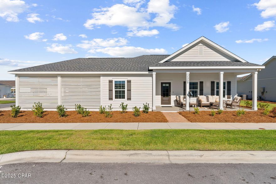 OPEN HOUSE SUNDAY 1/18 FROM 12-3! This furnished home is part of the sought-after Cottage Collection in the vibrant waterfront community of SweetBay! This charming cottage offers the perfect blend of style and convenience - ideal for those who want to enjoy life without the hassle of exterior maintenance.

The Elm plan by Harris Doyle Homes (no longer offered to build) features an inviting open-concept layout with a spacious great room, a large front porch, a covered rear porch, and an attached carport - perfect for entertaining or relaxing outdoors. Inside, you'll find granite countertops, stainless steel appliances, and luxury vinyl plank flooring throughout the main living areas. The primary suite boasts a generous walk-in closet and a beautifully tiled bathroom.

Living in SweetBay means enjoying a true coastal lifestyle with resort-style amenities, including access to North Bay for kayaking, paddle boarding, and fishing, multiple parks, 2 resort pools and playgrounds, basketball court, and plenty of scenic trails. A new Publix-anchored Town Center is here with shops and restaurants! Future amenities include a Marina District and much more.

Come experience easy coastal living in one of Panama City's most desirable communities!