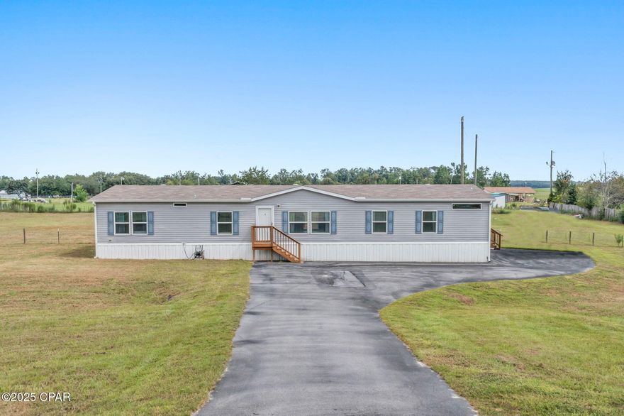 Embrace country living with this spacious beautifully maintained doublewide mobile home, perfectly situated on 1.75 acres of land. Ideal for families or those craving room to breathe, this property combines modern comfort with serene outdoor space.

Inside you will find an oversized kitchen with ample cabinet space, a large pantry, and a bright, open dining area perfect for home cooked meals and gatherings and an extra-large laundry room with a sink adding practicality to daily chores.

Additional features are a cozy living room, a den that can be used for a home office,
movie nights or a playroom, 4 generously sized bedrooms with the master bedroom separated from the other 3 offering a peaceful retreat, 3 full bathrooms with plenty of convenience for a busy household. 

Outside has lots to offer including plenty of room for a garden, a play area, or future projects, and a paved driveway.

Schedule a tour today!!!! Your oasis awaits!!!!!!